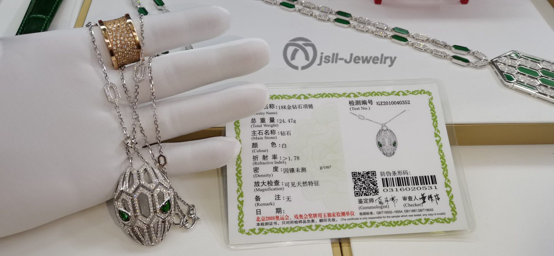 Jsll-Jewelry | 18K white gold inlaid with diamonds, emeralds, hollow snake head pendant necklace