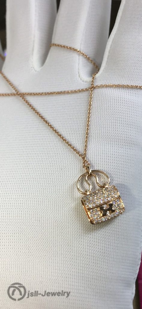 Jsll-Jewelry | 18K rose gold version of the small bag necklace